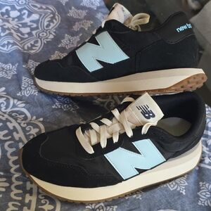 New Balance Black and Light Blue Athletic Shoes